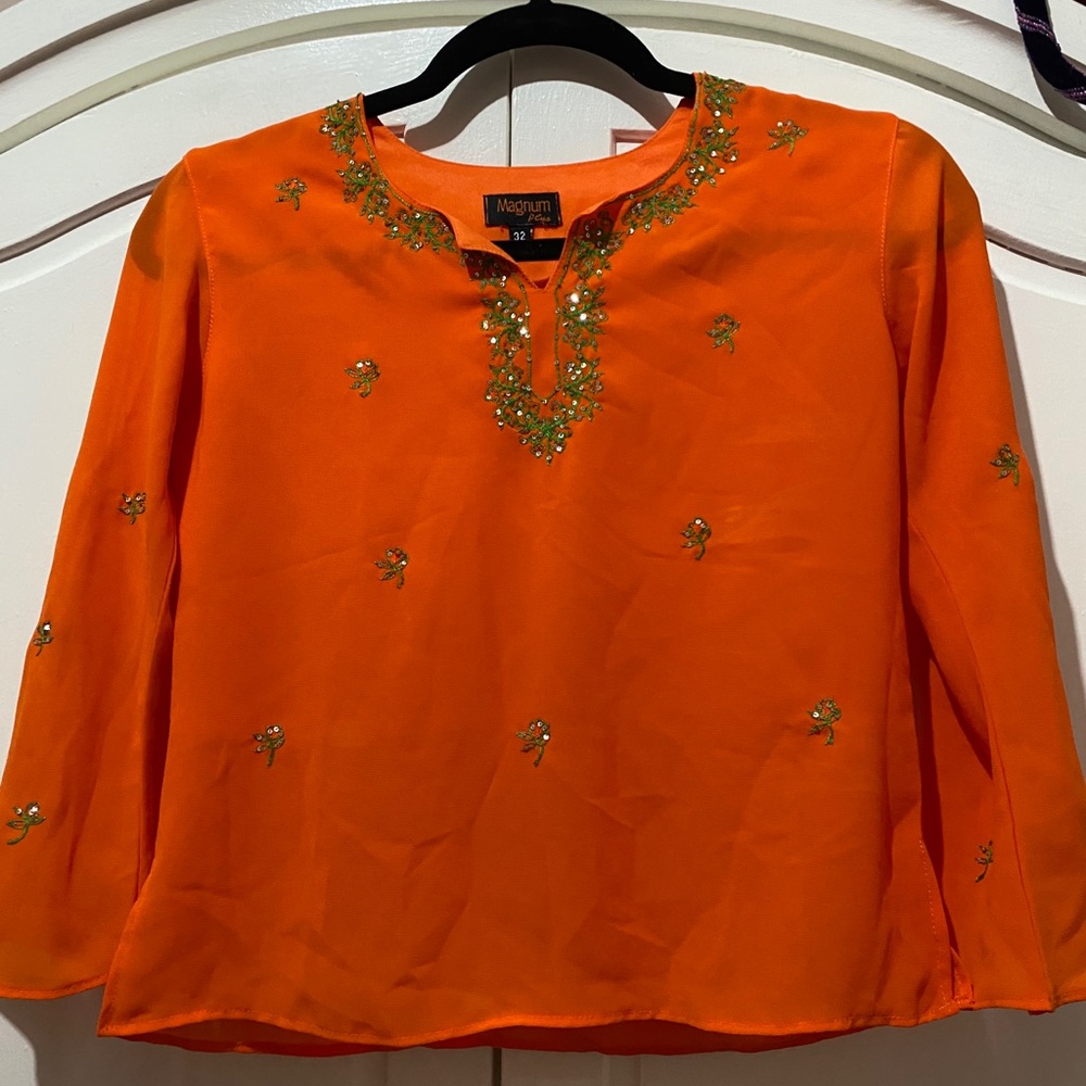 orange long sleeve blouse w/ green detail